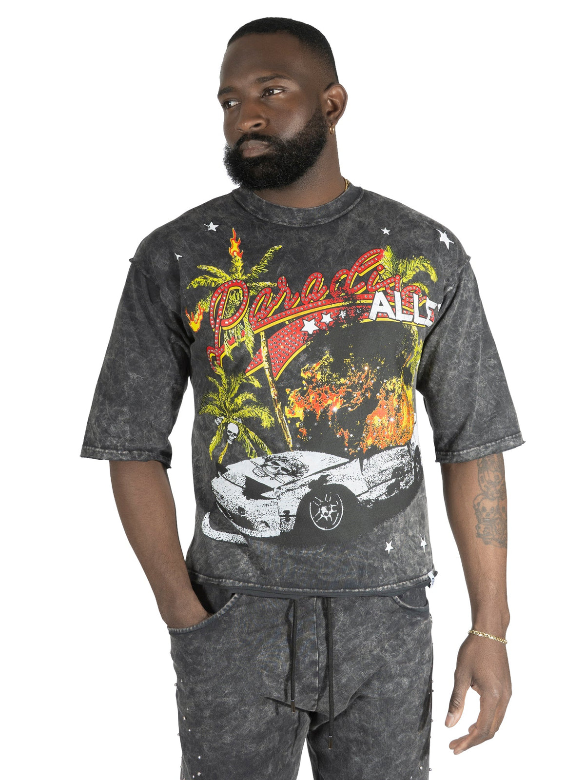 Makobi Motion Sickness Cropped Tee in Black, worn by a model