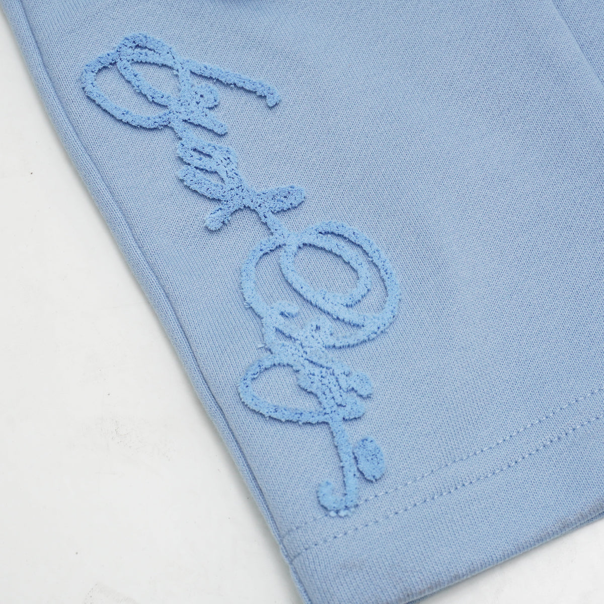 Makobi Frost Essential Fleece Shorts in Blue, detail view
