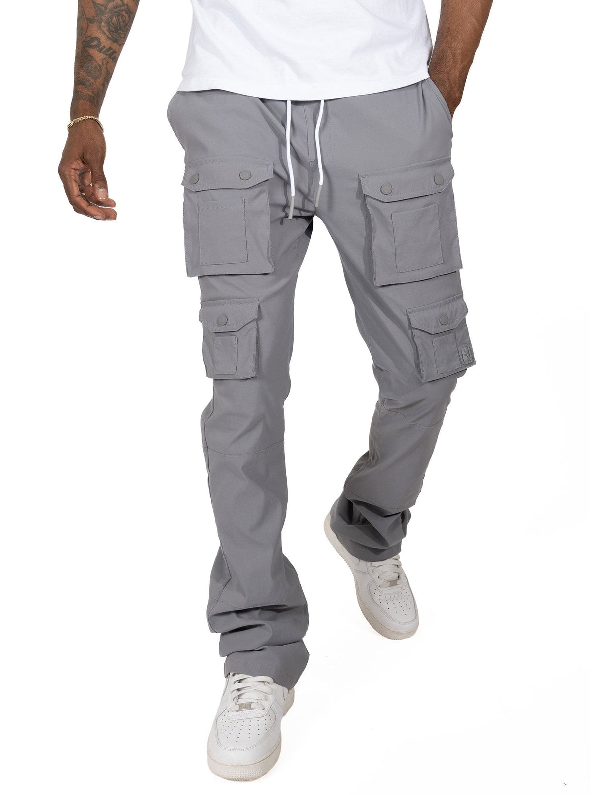 Makobi Colton 34” Stack Nylon/Spandex Sweat Pants in Dark Gray, worn by a model