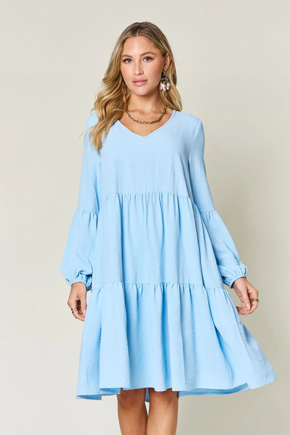 Garden Naked Double Take Full Size V-Neck Balloon Sleeve Tiered Dress with Pockets